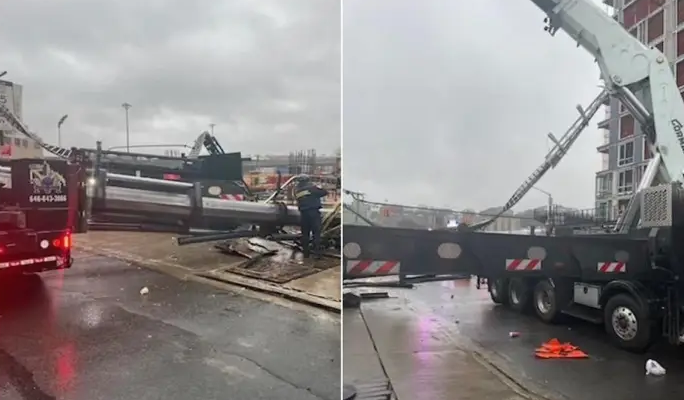 collapsed crane lying across a city street on a rainy day, highlighting the critical importance of risk management in construction.