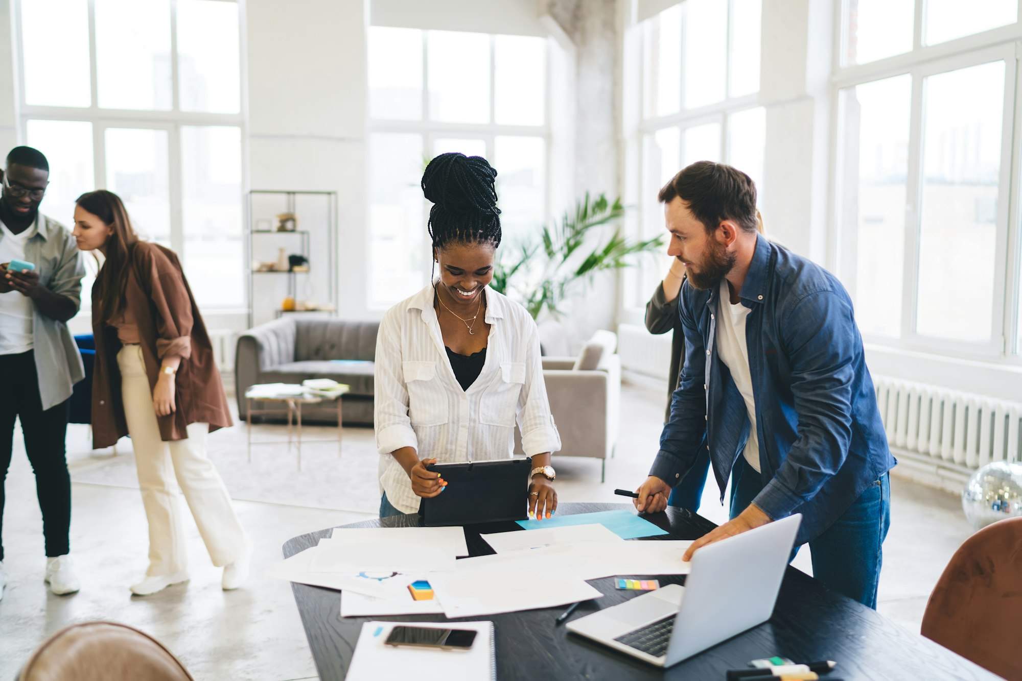 Diverse colleagues working in office