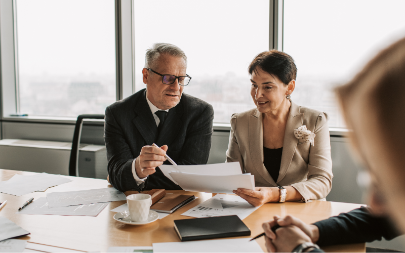 Business meeting with documents and discussion